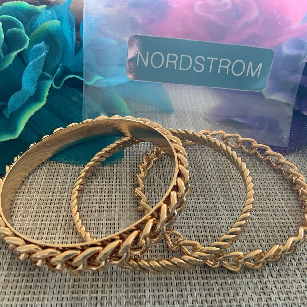 NWOT three gold bangle bracelets. 18k gold plated